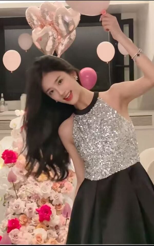31. Elegant Silver Top with Black Skirt - Image 3